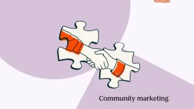 Two puzzle pieces forming a handshake, representing community marketing.