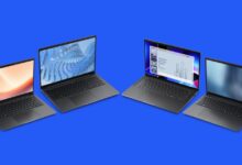 Four open Dell laptops with different screen displays on a blue background.