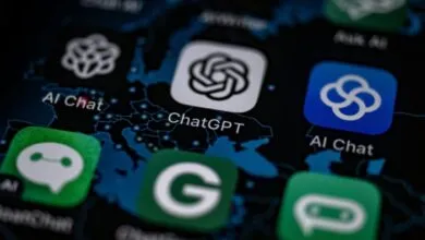 Close-up of a smartphone screen displaying AI app icons, including ChatGPT.