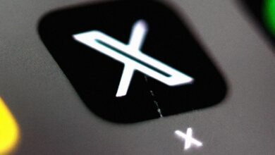 Close-up of the 'X' app icon on a device screen.