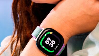 Fitbit Ace LTE smartwatch on wrist, displaying time and activity tracking.