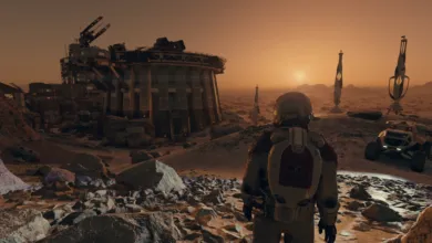 Astronaut looks toward a base on a rocky, orange alien planet.