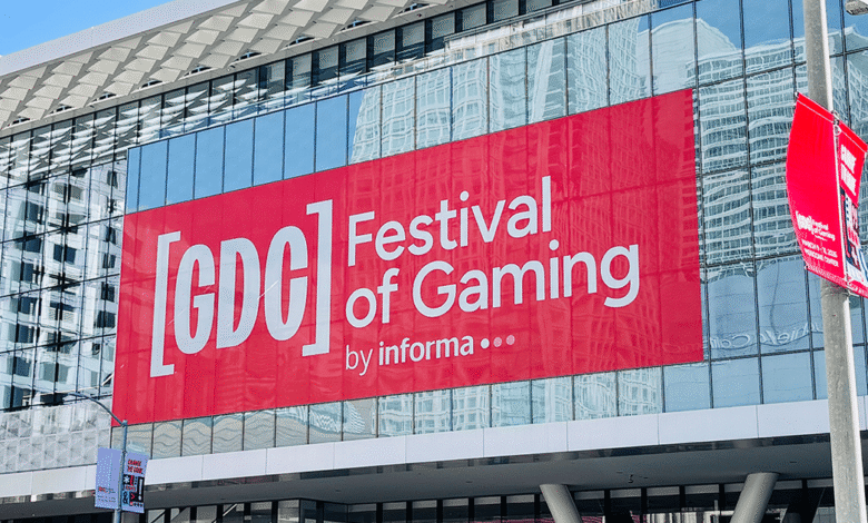 Large GDC Festival of Gaming banner on glass building facade.