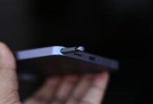 Close-up of a phone with an S Pen stylus being inserted.