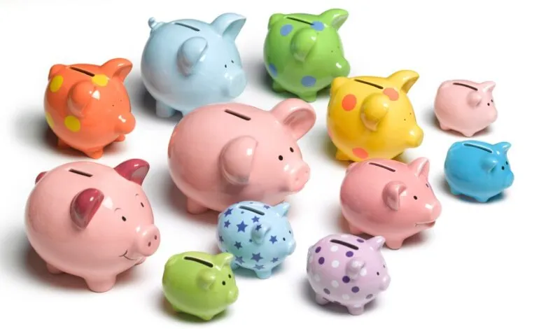 Collection of colorful piggy banks in various sizes and patterns.