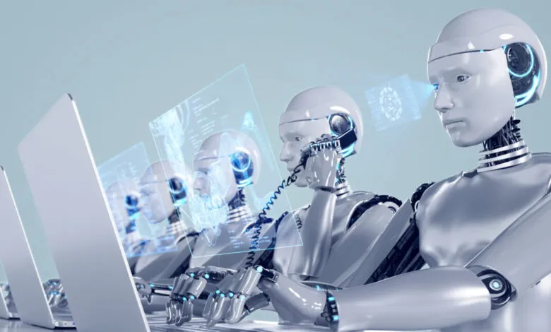 Robots working in an office, using laptops and phones, with digital interfaces.