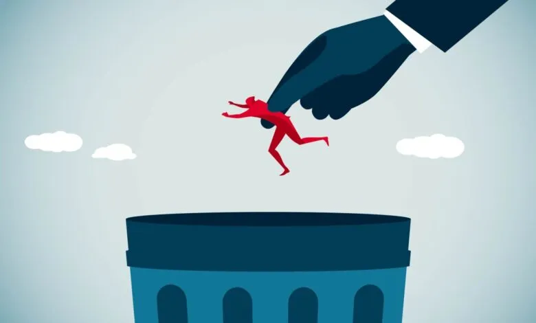 Large hand drops red figure into trash can, symbolizing rejection or failure.