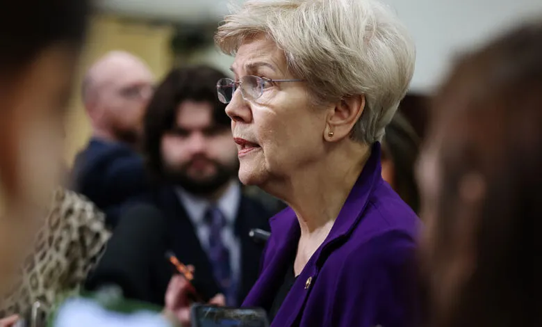 Senator Elizabeth Warren speaks to reporters after a briefing.