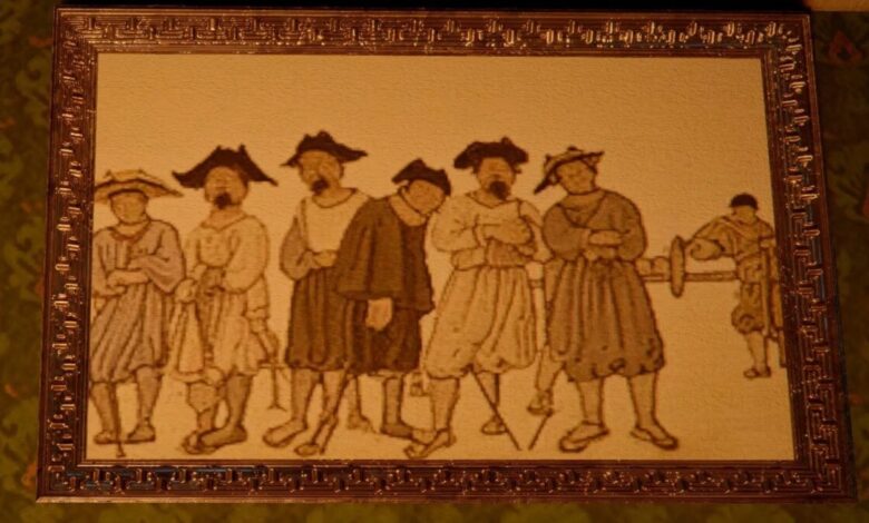 Framed tapestry depicting a group of men in historical attire.
