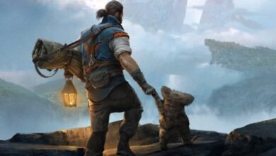 Character holds paw of small, bear-like creature, gazing at distant landscape.