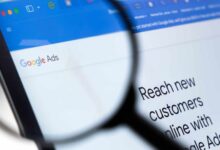 Google Ads interface magnified, showing 'Reach new customers' text.