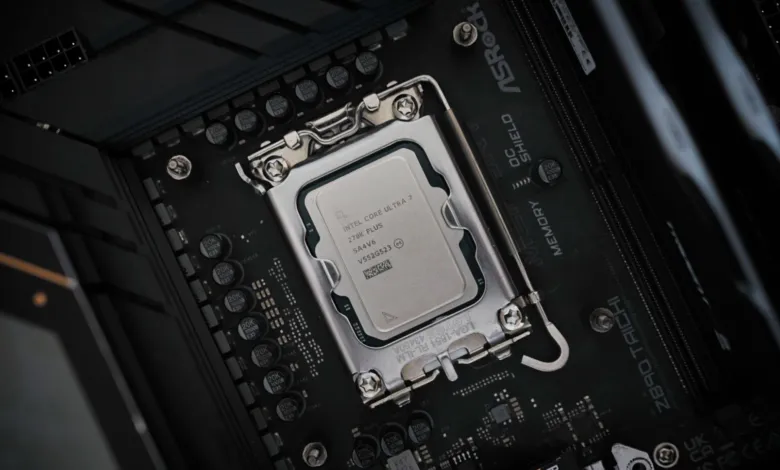 Close-up of an Intel Core Ultra 7 CPU installed on an ASRock Z890 Taichi motherboard.