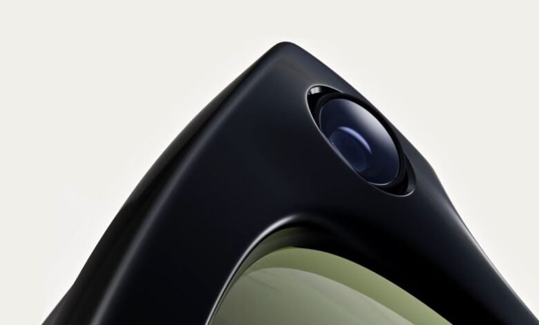 Close-up of smart glasses with integrated camera lens.