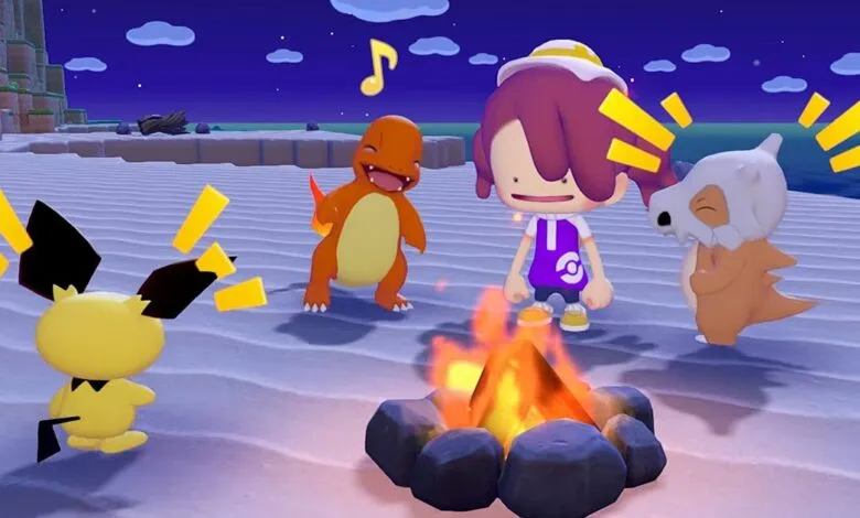 Pokemon characters Ditto, Charmander, Cubone, and Pichu around a campfire on a beach.