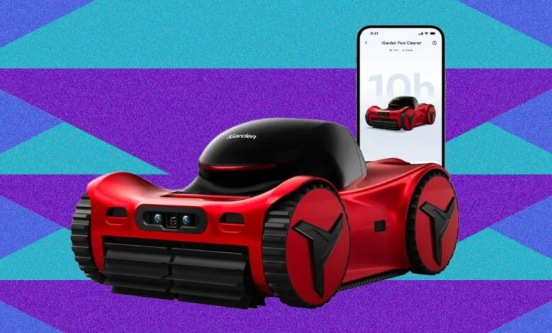 Red iGarden pool cleaning robot with phone showing app interface.