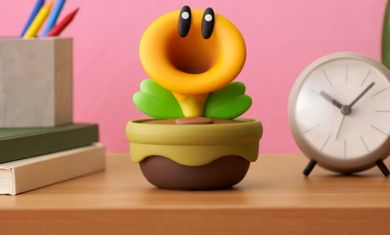 Cartoon Piranha Plant figure in pot on desk with books and clock.