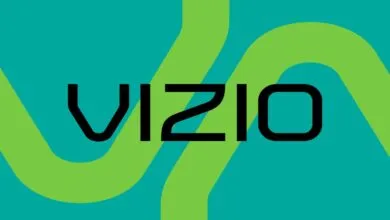 Vizio logo in black against a teal and green abstract background.