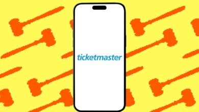 Ticketmaster app displayed on a phone against a gavel background.