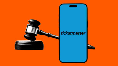 Gavel striking a smartphone displaying the Ticketmaster logo.