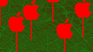 Red apple logos on sticks over a green map background.