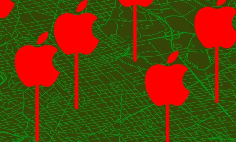Red apple logos on sticks over a green map background.