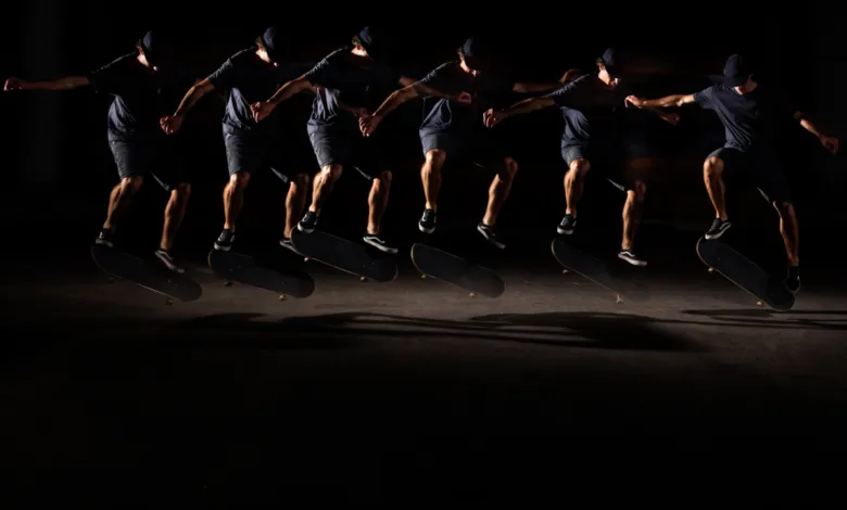 Multiple exposures show skateboarder in mid-air performing a trick.