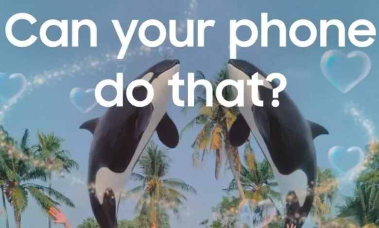 Two orca statues face each other with text 'Can your phone do that?'
