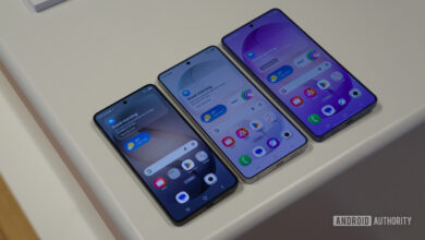 Three smartphones display 'Good morning' screens with app icons on a white surface.