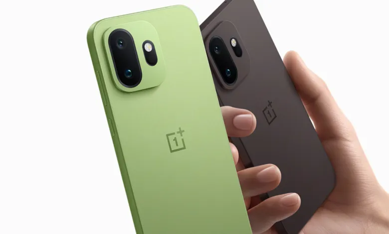 Two OnePlus phones, one green and one brown, held in a hand against a white background.