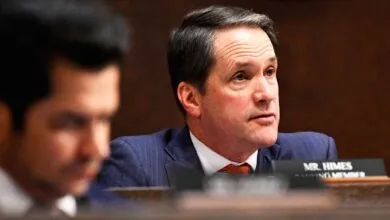 Representative Jim Himes at a congressional hearing, focused expression.