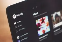 Spotify app interface on a tablet showing the home screen and mood playlists.