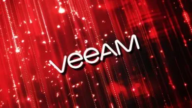 Veeam logo in white against a red, sparkling background.