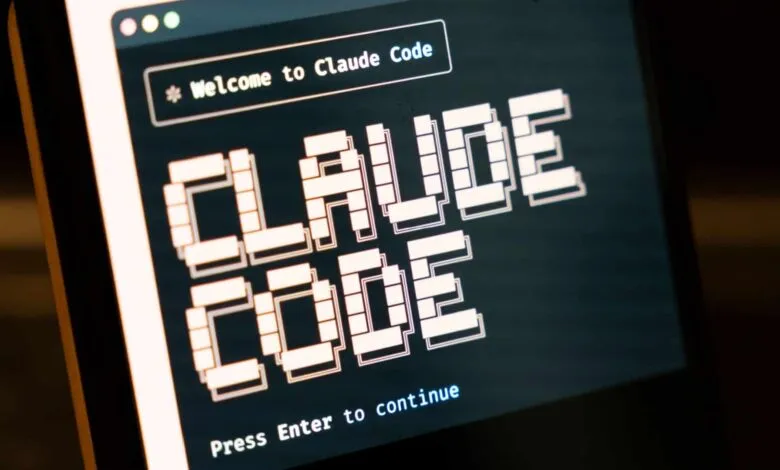 Screen displays 'Welcome to Claude Code' in pixelated font.