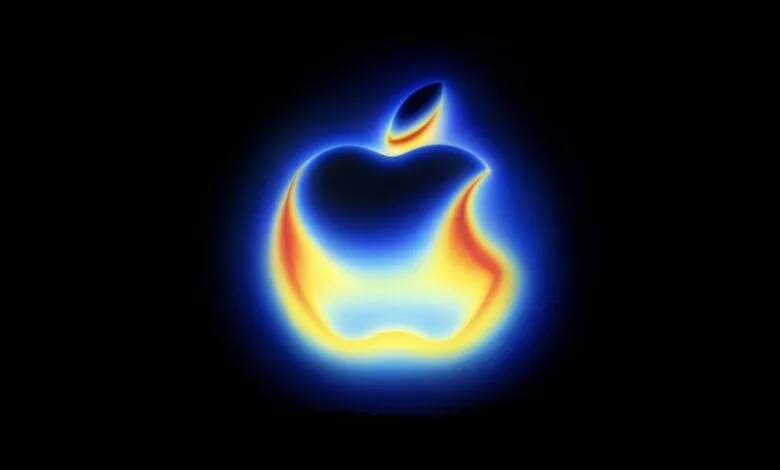 Glowing Apple logo with blue and orange gradient against a black background.