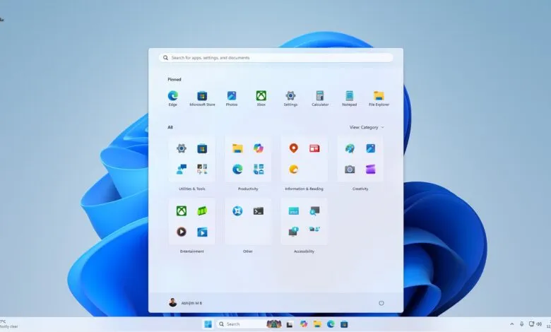 Windows 11 Start menu showing pinned and all apps categories.