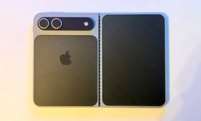 Mockup of a foldable iPhone with a dual-screen design and camera module.
