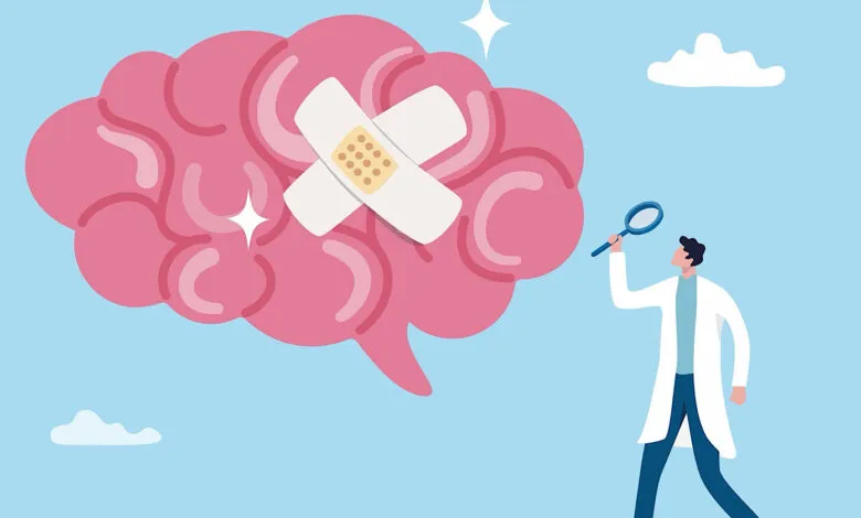 Cartoon brain with bandage being examined by doctor with magnifying glass.