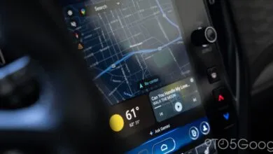 Car dashboard screen showing navigation, weather, and music information.