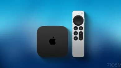 Apple TV 4K box and remote on a blue gradient background.