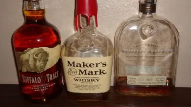Three bourbon bottles: Buffalo Trace, Maker's Mark, and Woodford Reserve.