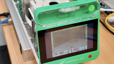 Cortical Labs device displaying the game Doom on its screen.