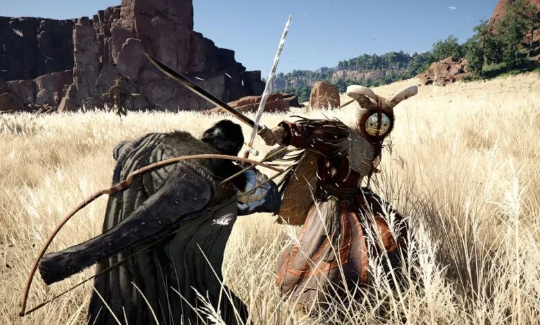 Two figures engaged in combat with swords and a bow in a grassy field.