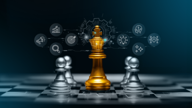 Golden king chess piece surrounded by silver pawns on a chessboard.