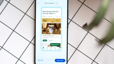 Smartphone displaying the Starbucks app interface with a gold status promotion.