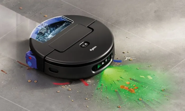 Dyson robot vacuum cleaner navigating a messy floor with food debris.