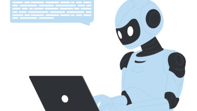 Illustration of a light blue robot working on a laptop with a speech bubble.