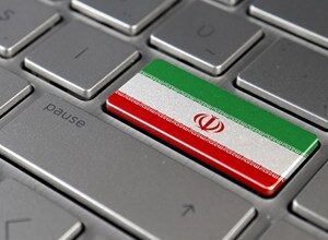 Keyboard key with the Iranian flag on it, next to the pause button.