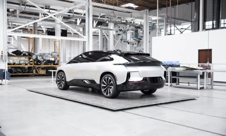 Faraday Future FF91 electric car prototype in a factory setting.