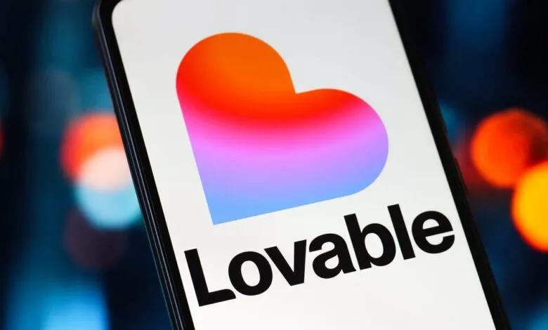 Lovable app logo on a smartphone screen with a gradient heart icon.
