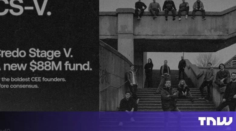 Black and white photo of a team standing on concrete stairs.